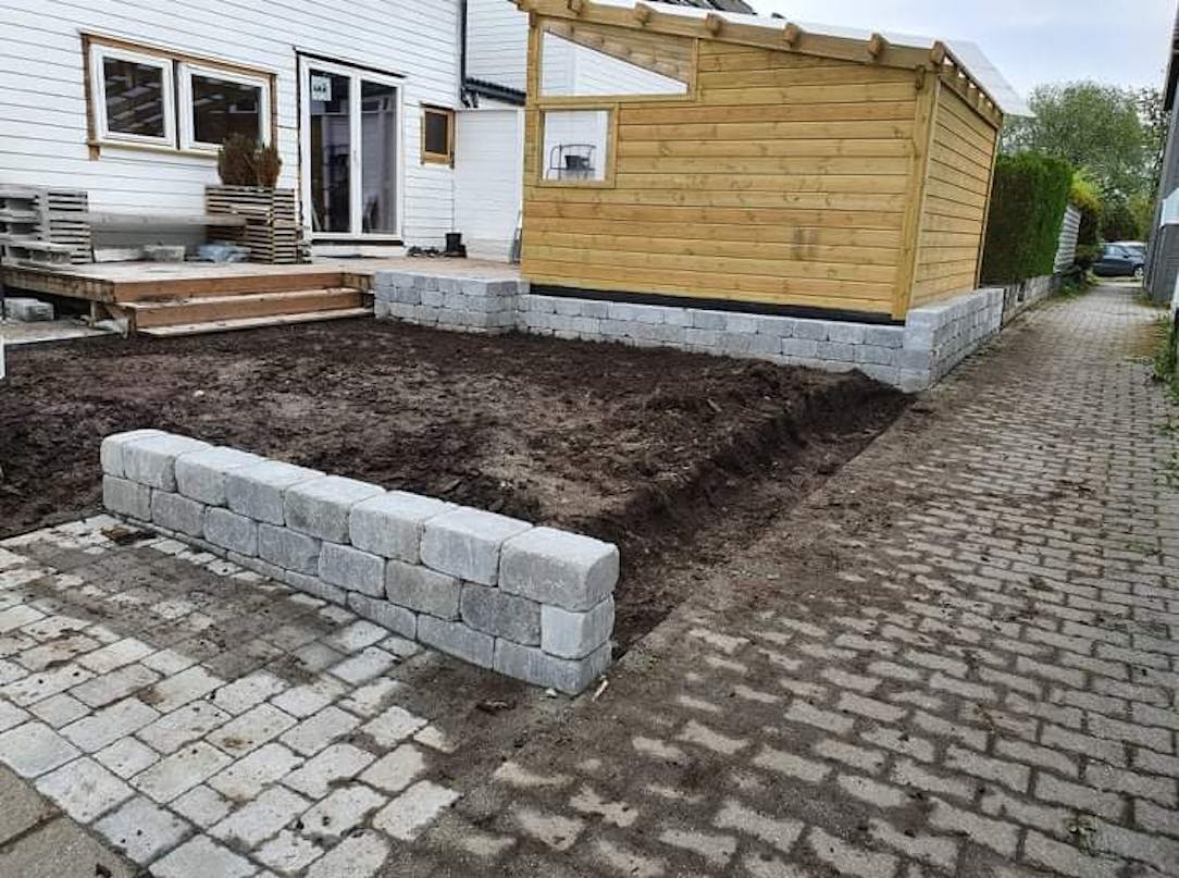 Havestue med sofa og udekøkken Havestue med sofa og udekøkken